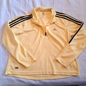 Adidas women's size large yellow climalite shirt, mark on sleeve